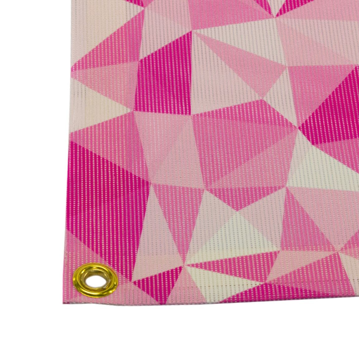 A detailed close-up of a professionally printed mesh banner by Carrick Signs, showing the perforated PVC material designed for airflow, along with reinforced edges that improve durability and performance in outdoor environments.